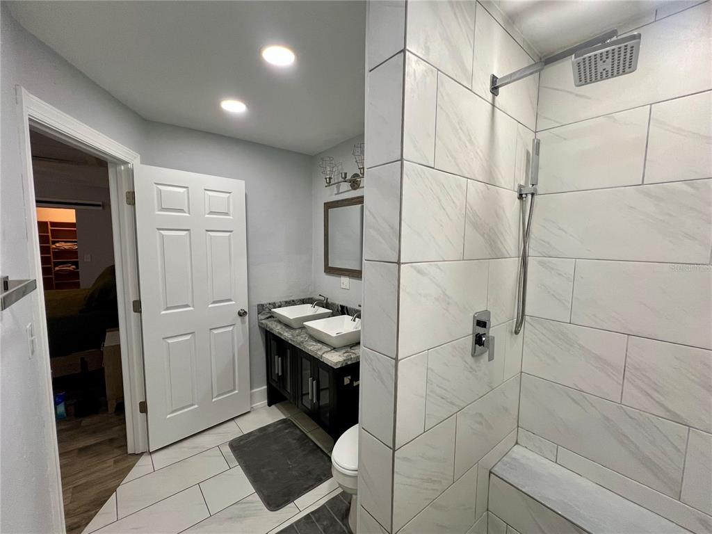 112 Rose Street Venice, FL 34293 - Photo 22 of 33 a bathroom with a shower