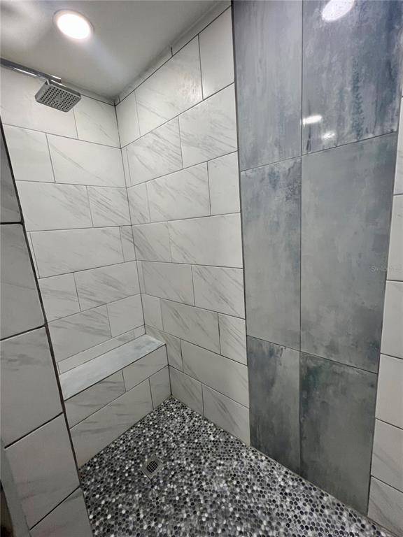112 Rose Street Venice, FL 34293 - Photo 23 of 33 a bathroom with a shower