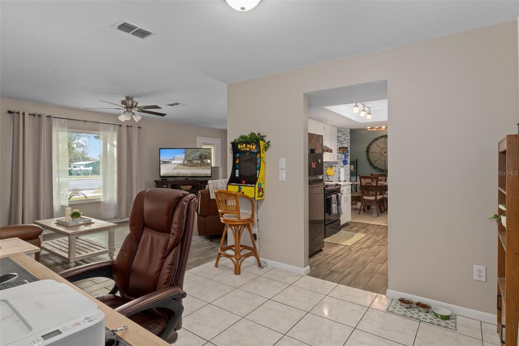 6101 County Line Road Spring Hill, FL 34606 - Photo 13 of 40 a view of a livingroom with furniture and windows