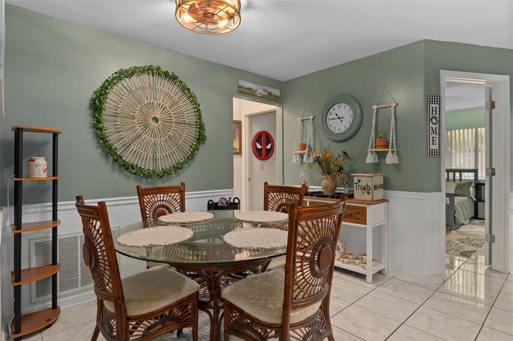 6101 County Line Road Spring Hill, FL 34606 - Photo 17 of 40 a view of a dining room with furniture