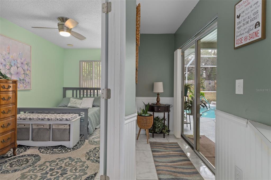 6101 County Line Road Spring Hill, FL 34606 - Photo 28 of 40 a kitchen with a stove and a chandelier