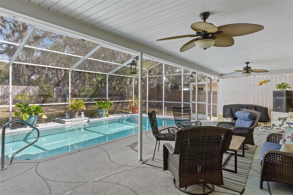 6101 County Line Road Spring Hill, FL 34606 - Photo 32 of 40 a view of a livingroom with furniture and garden