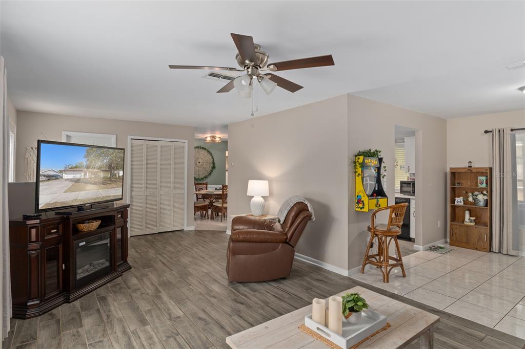 6101 County Line Road Spring Hill, FL 34606 - Photo 9 of 40 a living room with furniture and wooden floor