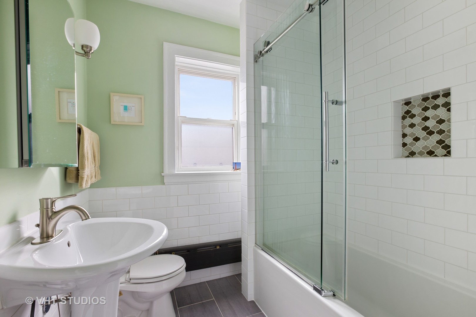 1946 West Patterson Avenue, Unit 2 Chicago, IL 60613 - Photo 11 of 13 a bathroom with a sink a toilet and shower