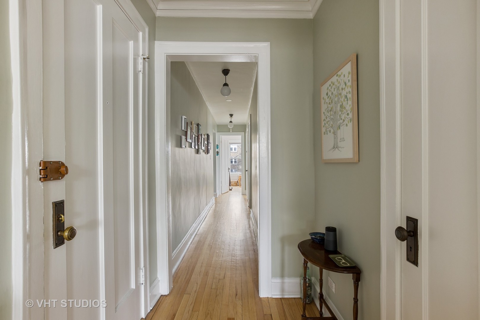 1946 West Patterson Avenue, Unit 2 Chicago, IL 60613 - Photo 4 of 13 a view of a hallway with wooden floor and closet area