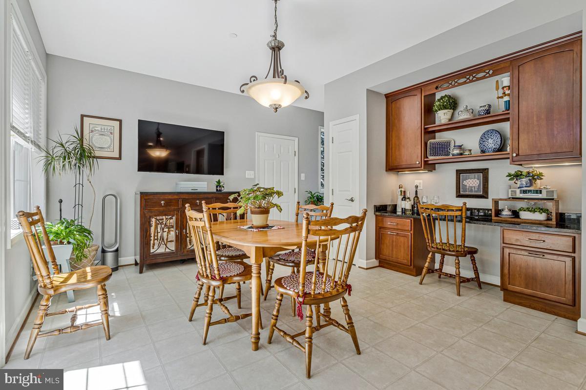 11565 Magnolia Court Issue, MD 20645 - Photo 21 of 68 a view of a dining room with furniture