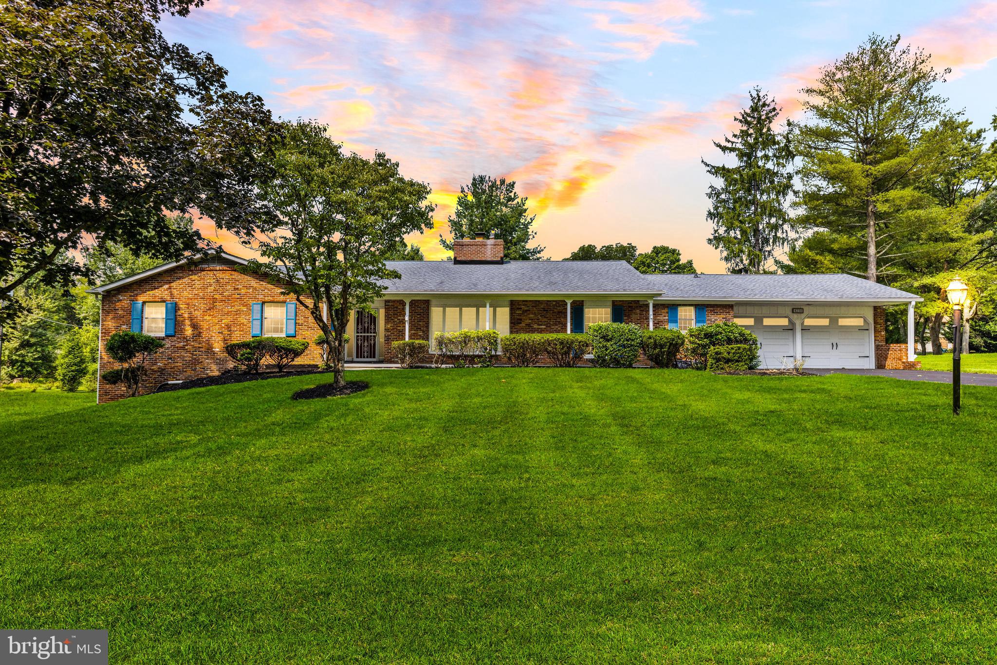 4218 Southfield Road Ellicott City, MD 21042 - Photo 1 of 59 a front view of a house with a yard