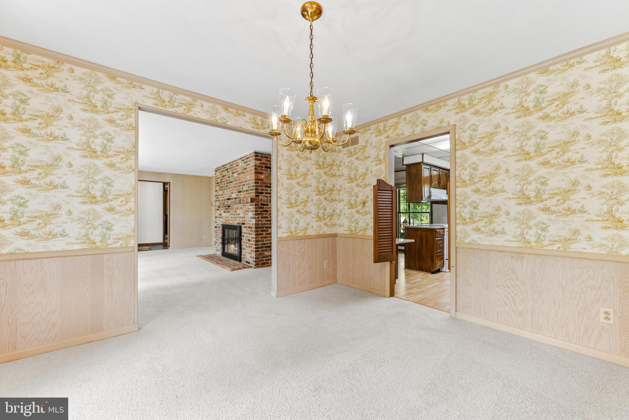 4218 Southfield Road Ellicott City, MD 21042 - Photo 12 of 59 a view of a hallway with a chandelier