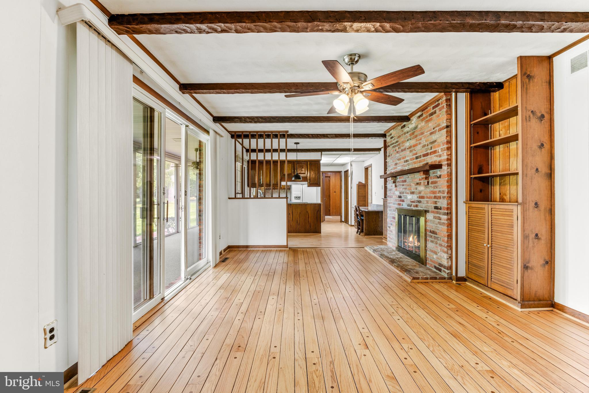 4218 Southfield Road Ellicott City, MD 21042 - Photo 24 of 59 a view of a living room with a wooden floor
