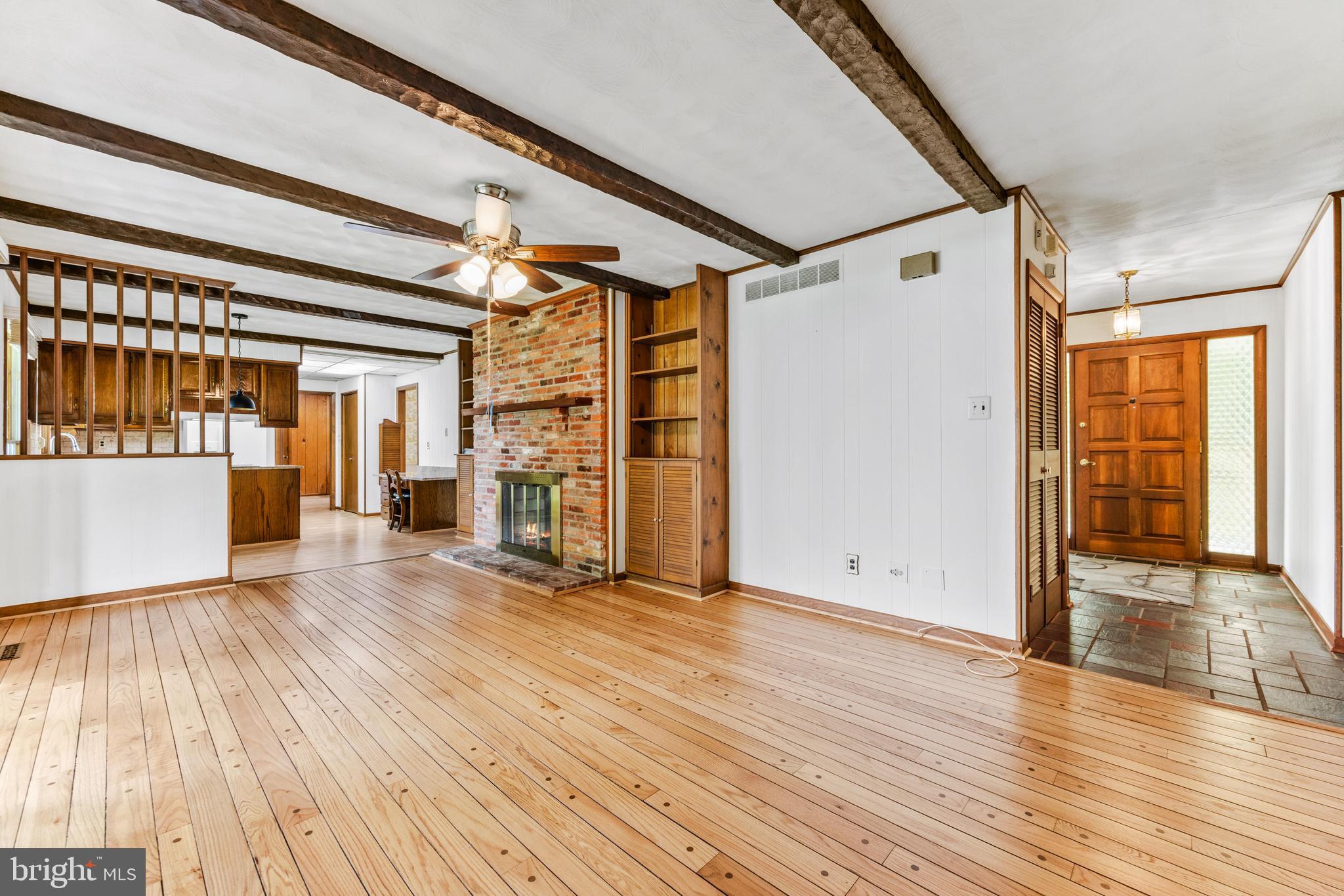 4218 Southfield Road Ellicott City, MD 21042 - Photo 25 of 59 a view of a big room with wooden floor and windows