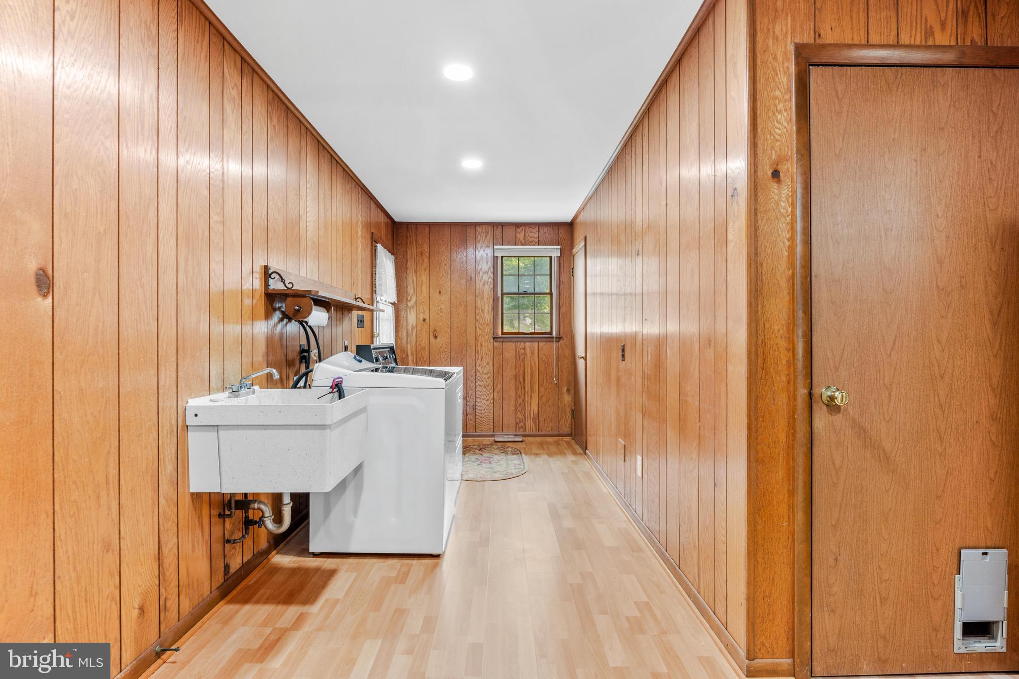 4218 Southfield Road Ellicott City, MD 21042 - Photo 28 of 59 a view of a hallway with wooden floor windows