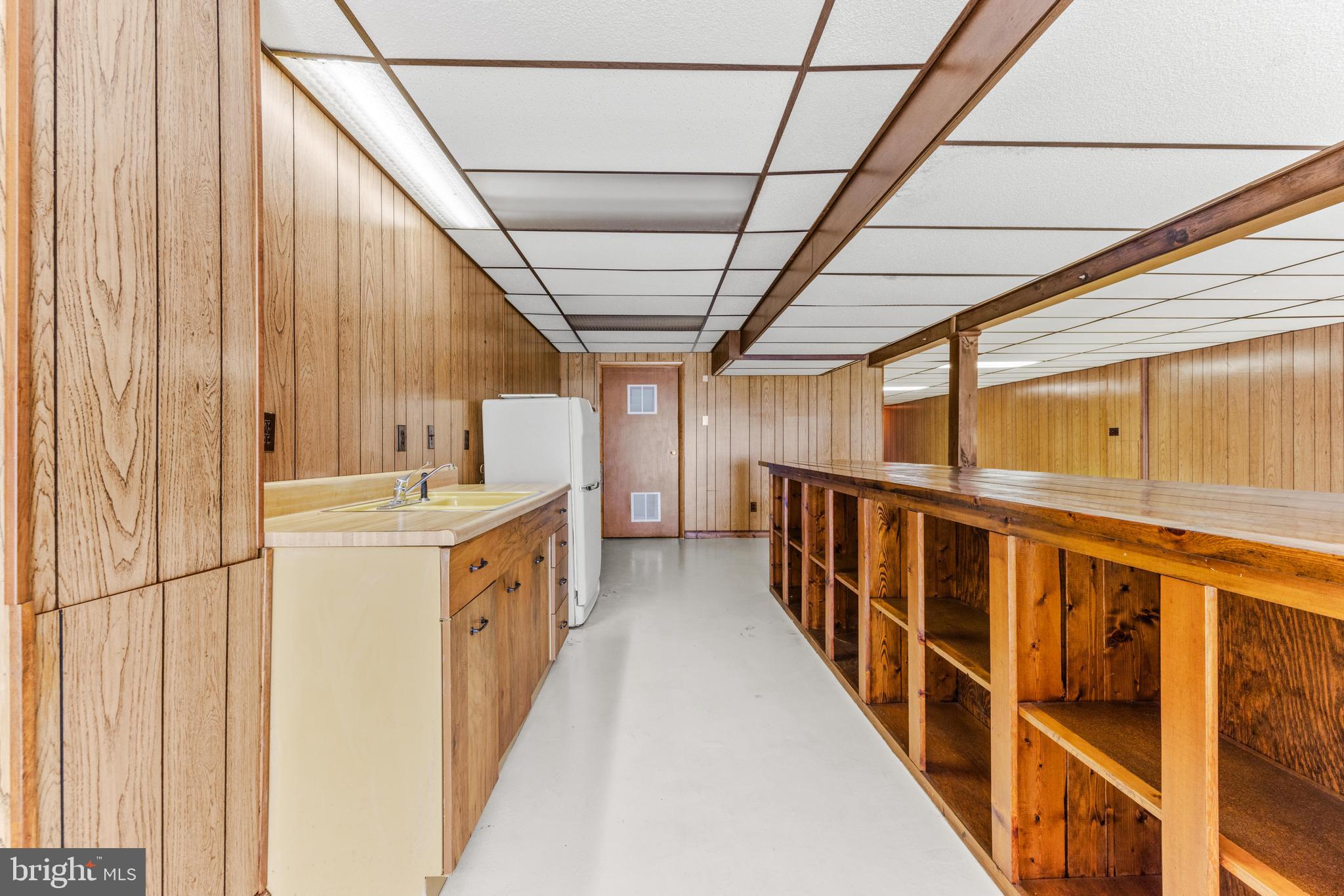 4218 Southfield Road Ellicott City, MD 21042 - Photo 46 of 59 a utility room with wooden floor and windows