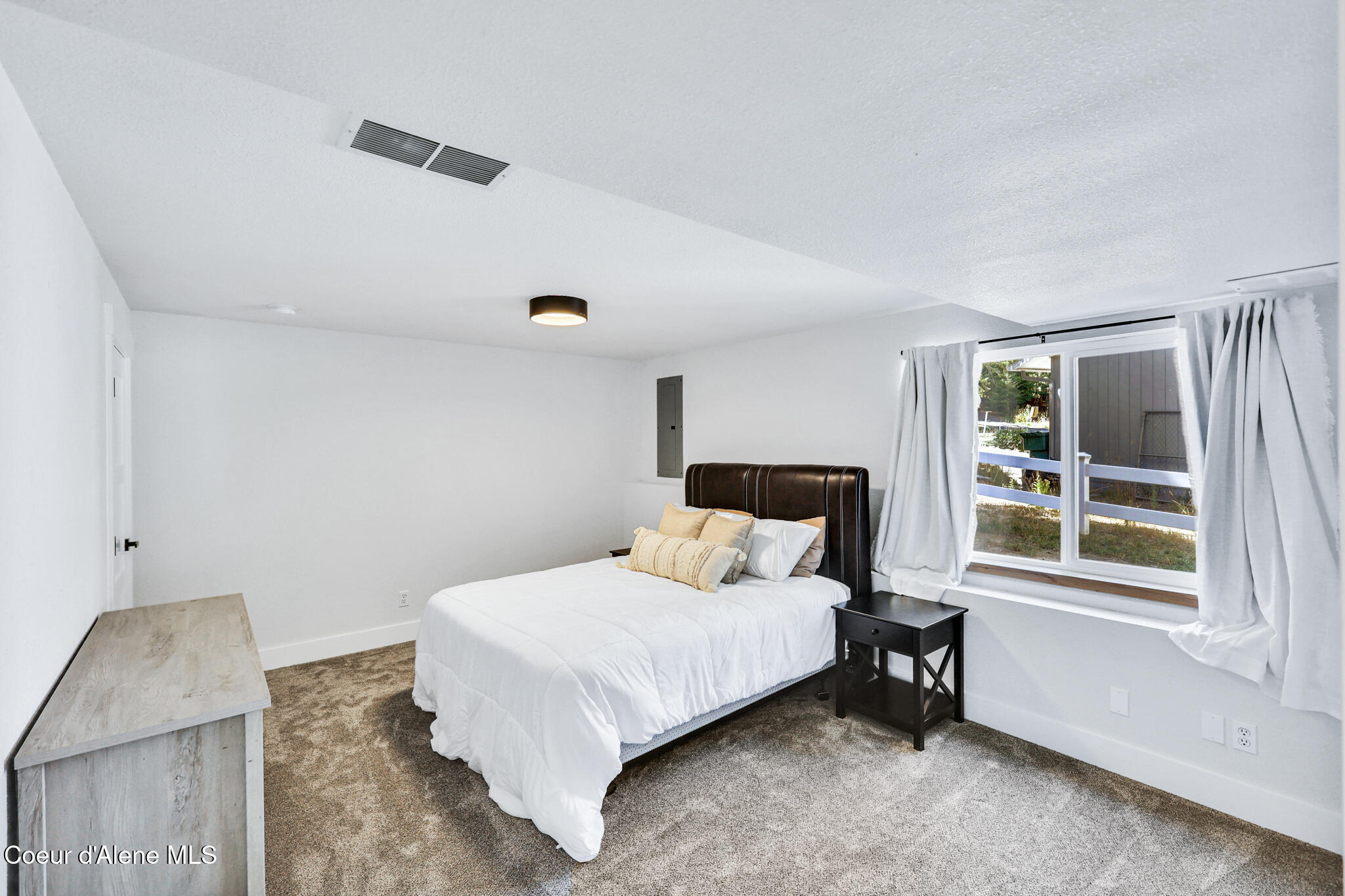 6079 East Hayden Lake Road Hayden, ID 83835 - Photo 45 of 94 DOWNSTAIRS BEDROOM