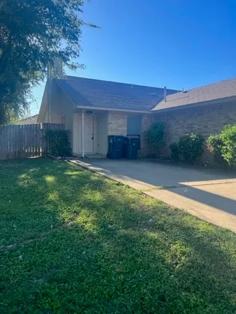 a view of a backyard with a garden