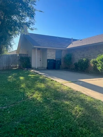 a view of a backyard with a garden