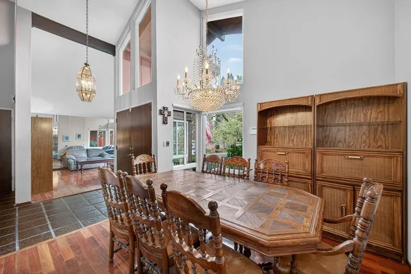 a view of a dining room with furniture window and outside view