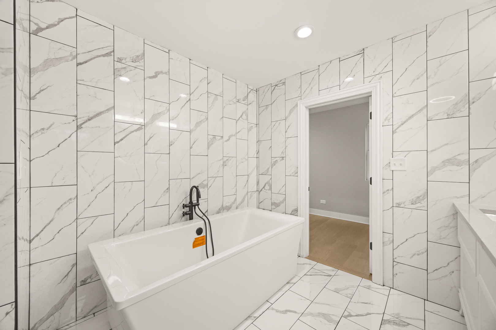 6748 South Indiana Avenue Chicago, IL 60637 - Photo 12 of 19 a bathroom with a bathtub and shower