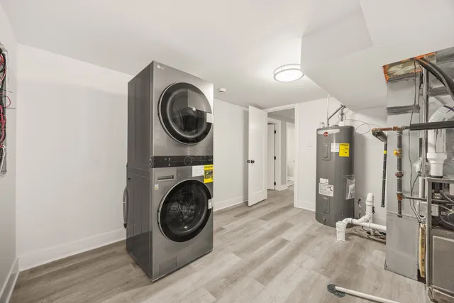a view of a hallway with washer and dryer