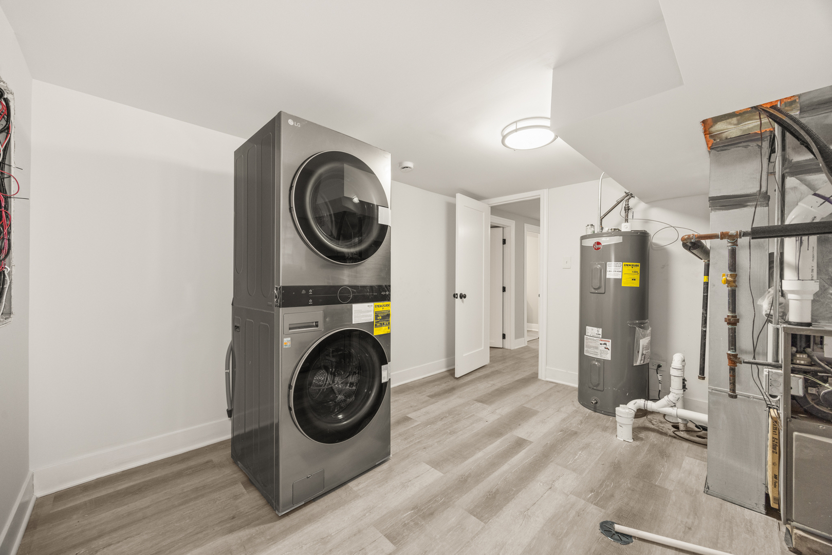 6748 South Indiana Avenue Chicago, IL 60637 - Photo 16 of 19 a view of a hallway with washer and dryer