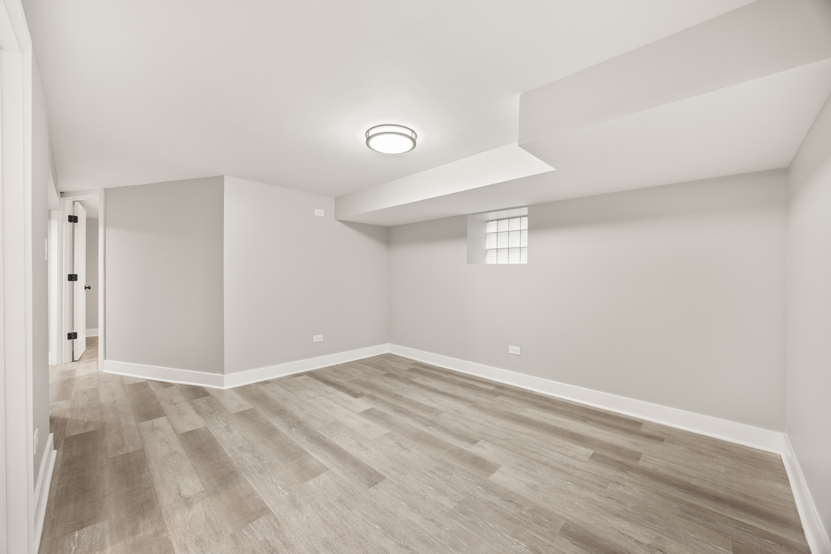 6748 South Indiana Avenue Chicago, IL 60637 - Photo 18 of 19 a view of an empty room with a window