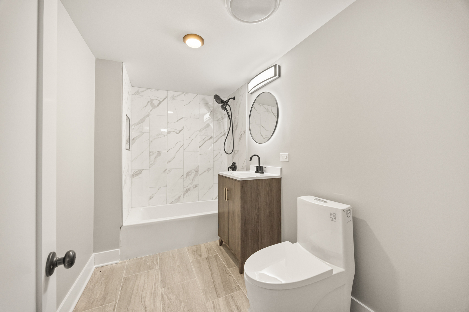 6748 South Indiana Avenue Chicago, IL 60637 - Photo 19 of 19 a bathroom with a toilet sink and shower