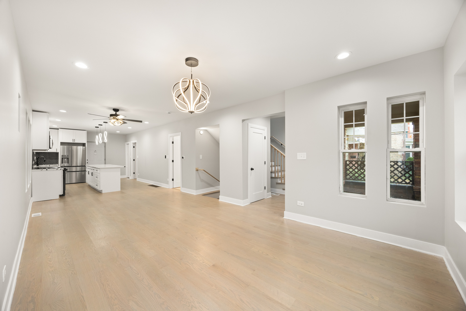 6748 South Indiana Avenue Chicago, IL 60637 - Photo 2 of 19 a view of a livingroom with a kitchen and a window