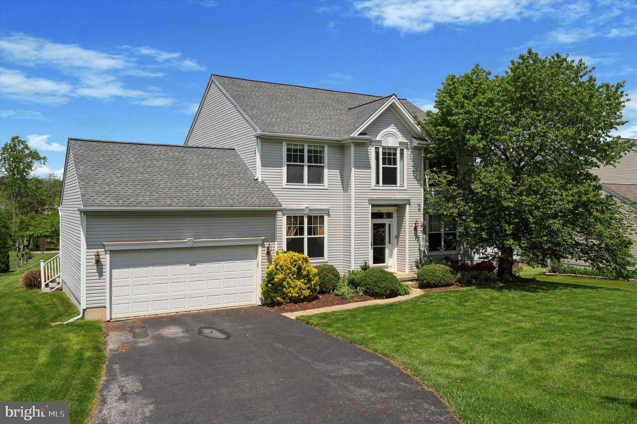 a house view with a garden space