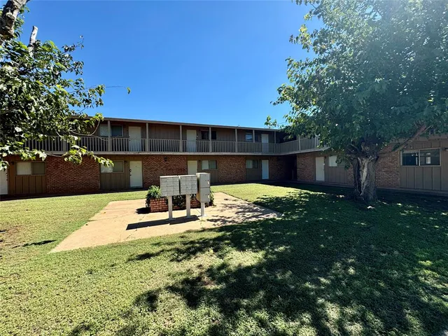a view of backyard with a table and chair