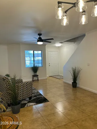 a view of a kitchen with a sink and cabinets