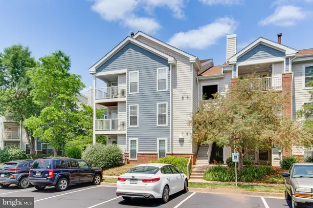 a car parked in front of a house