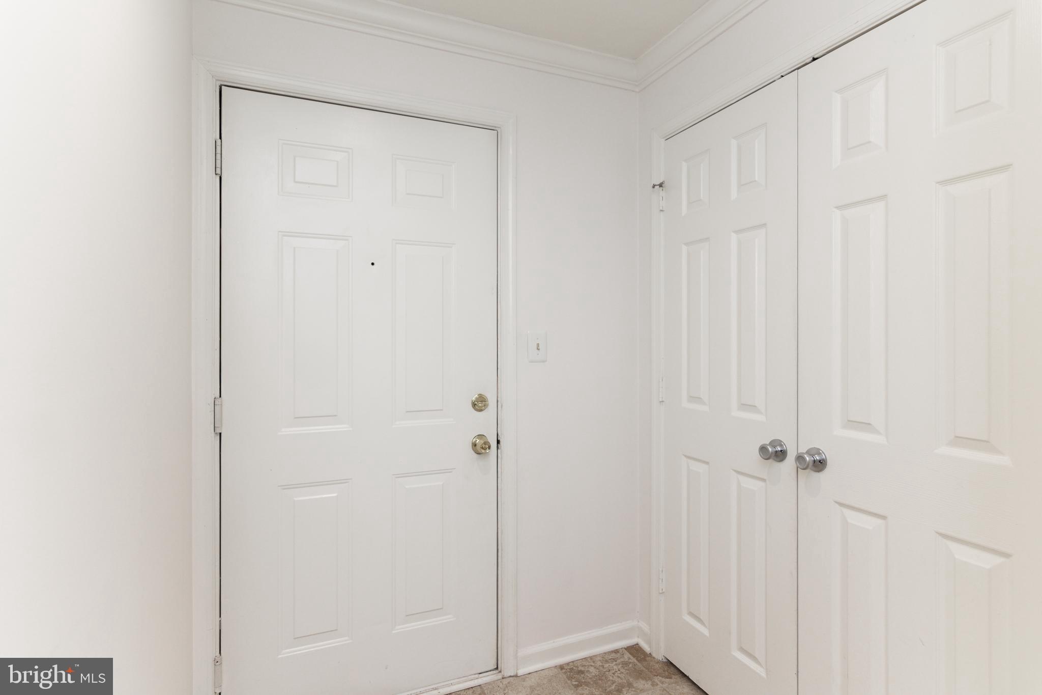 20958 Timber Ridge Terrace, Unit 201 Ashburn, VA 20147 - Photo 5 of 25 a view of a closet area