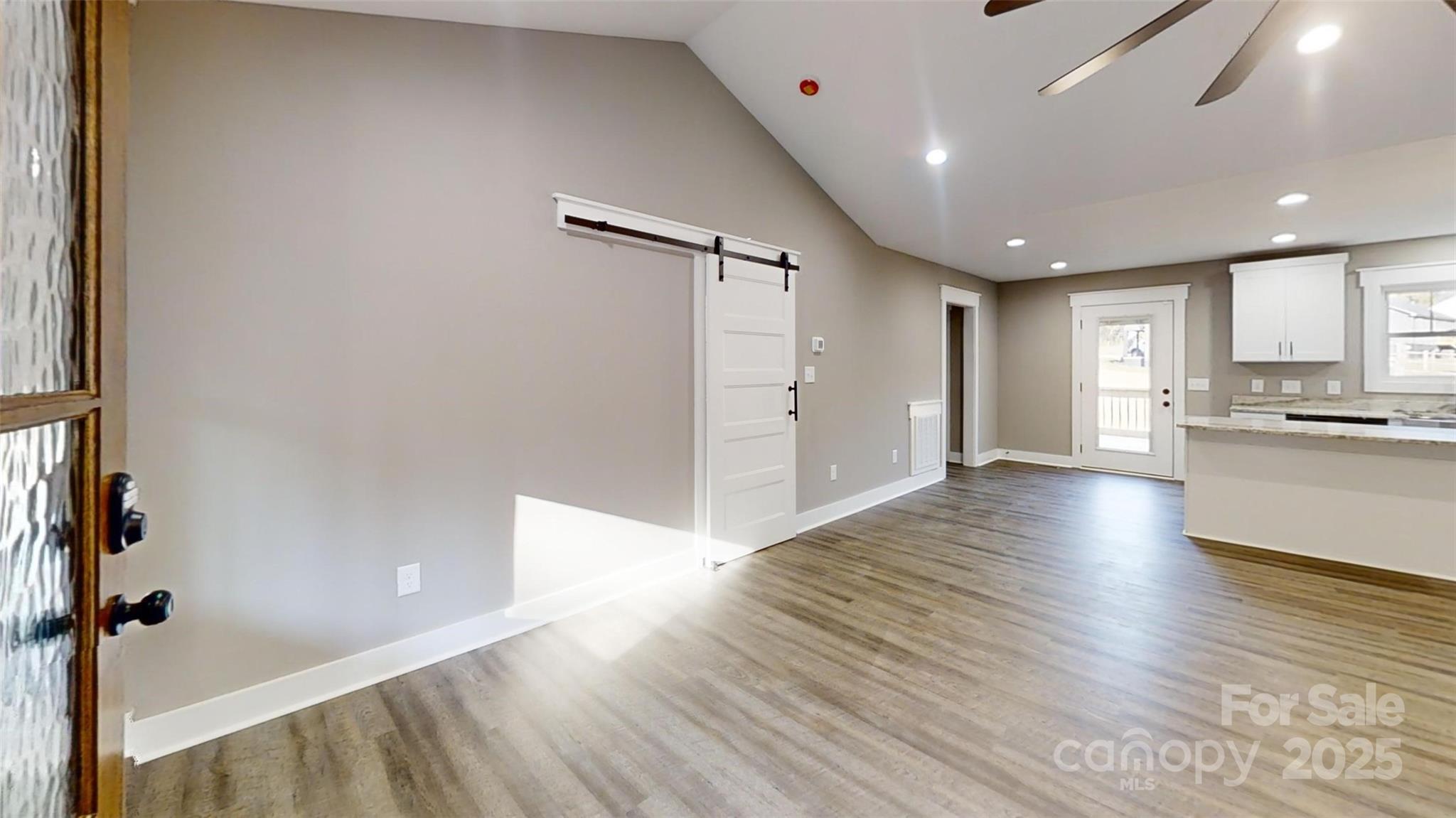 268 Vic Randall Road Lawndale, NC 28090 - Photo 17 of 22 a view of kitchen with cabinets and wooden floor
