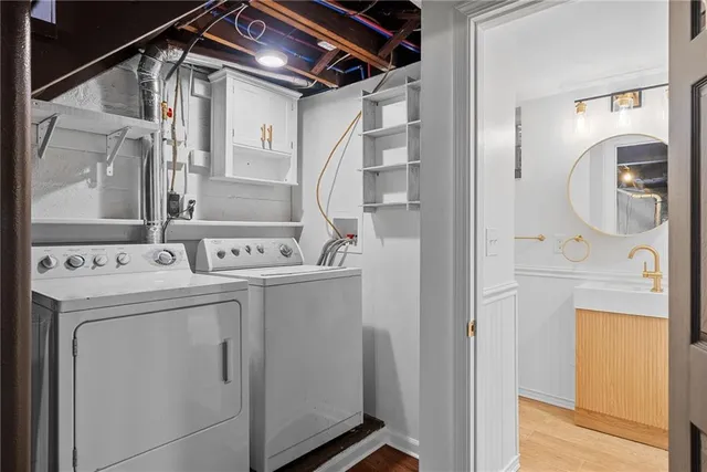 a utility room with dryer and washer