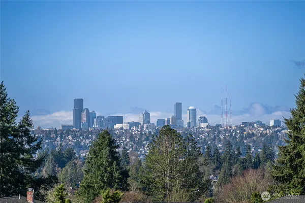 a view of a city with tall buildings in the background