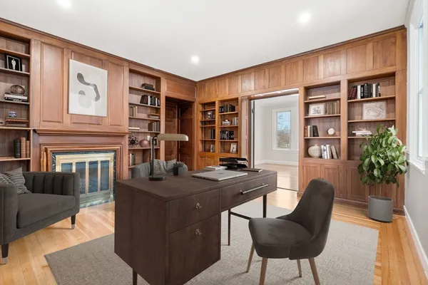 a view of a livingroom with furniture and window