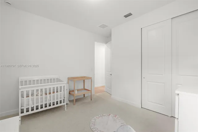 a bathroom with a sink and a shower