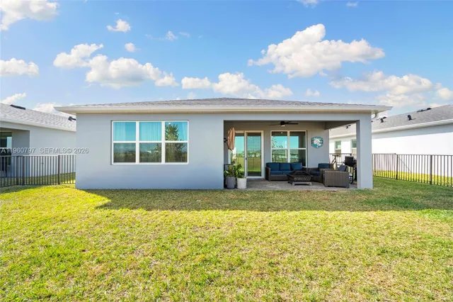 a view of a swimming pool with a lake in the background