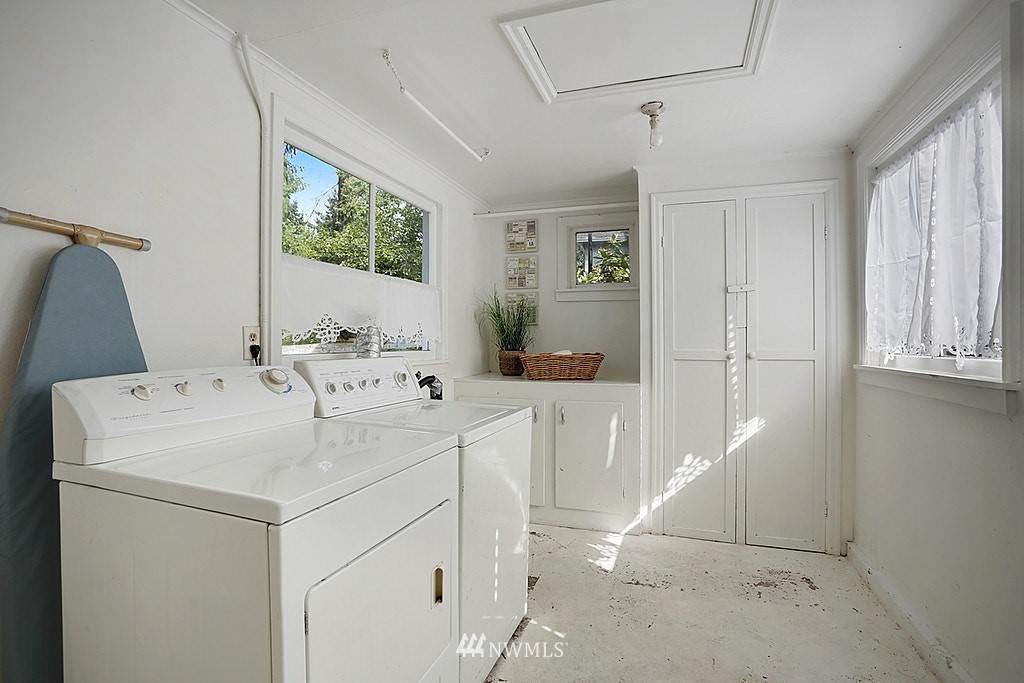 8729 236th Street Southwest Edmonds, WA 98026 - Photo 12 of 15 a utility room with dryer and washer