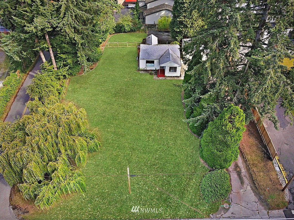 8729 236th Street Southwest Edmonds, WA 98026 - Photo 15 of 15 an aerial view of a house with a yard
