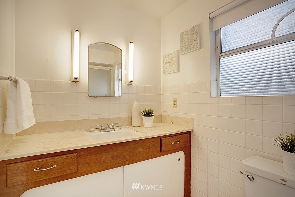 8729 236th Street Southwest Edmonds, WA 98026 - Photo 10 of 15 a bathroom with a sink and a mirror