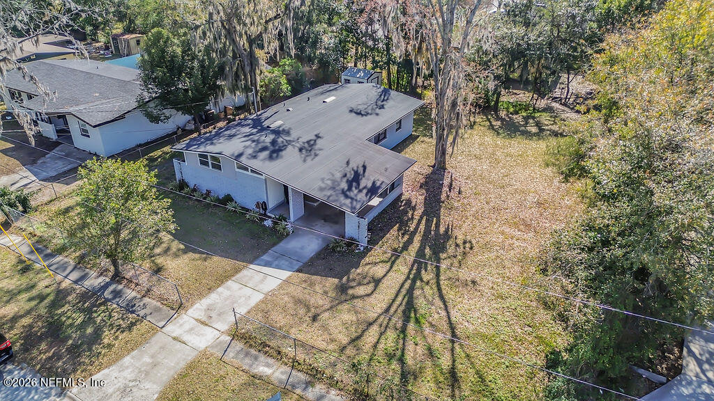 7580 Strato Road Jacksonville, FL 32210 - Photo 27 of 27 an aerial view of a house with a yard