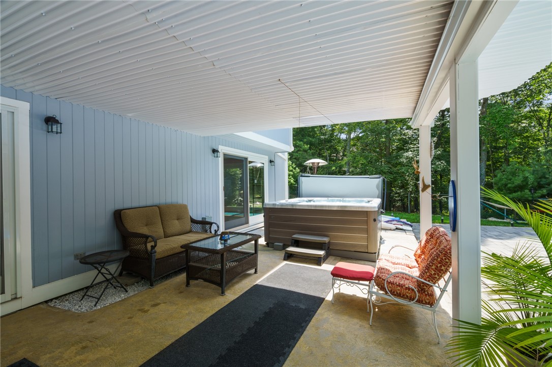 54 Ridge Drive Exeter, RI 02822 - Photo 40 of 49 Below Deck to Lower Level Entrance and Jacuzzi