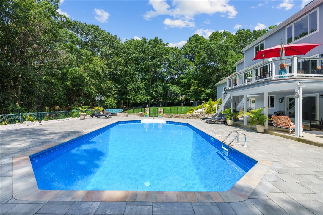 54 Ridge Drive Exeter, RI 02822 - Photo 42 of 49 Firepit and lounging area facing pool