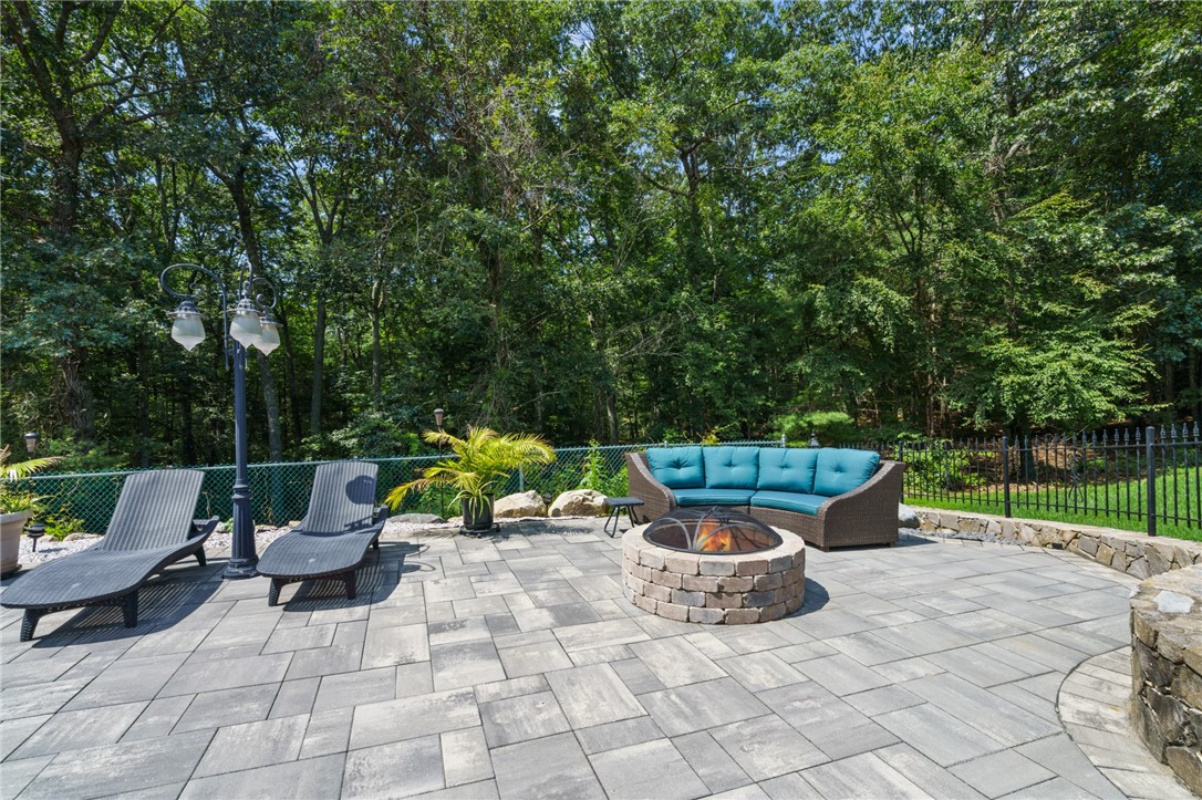 54 Ridge Drive Exeter, RI 02822 - Photo 43 of 49 Firepit and lounging area facing pool