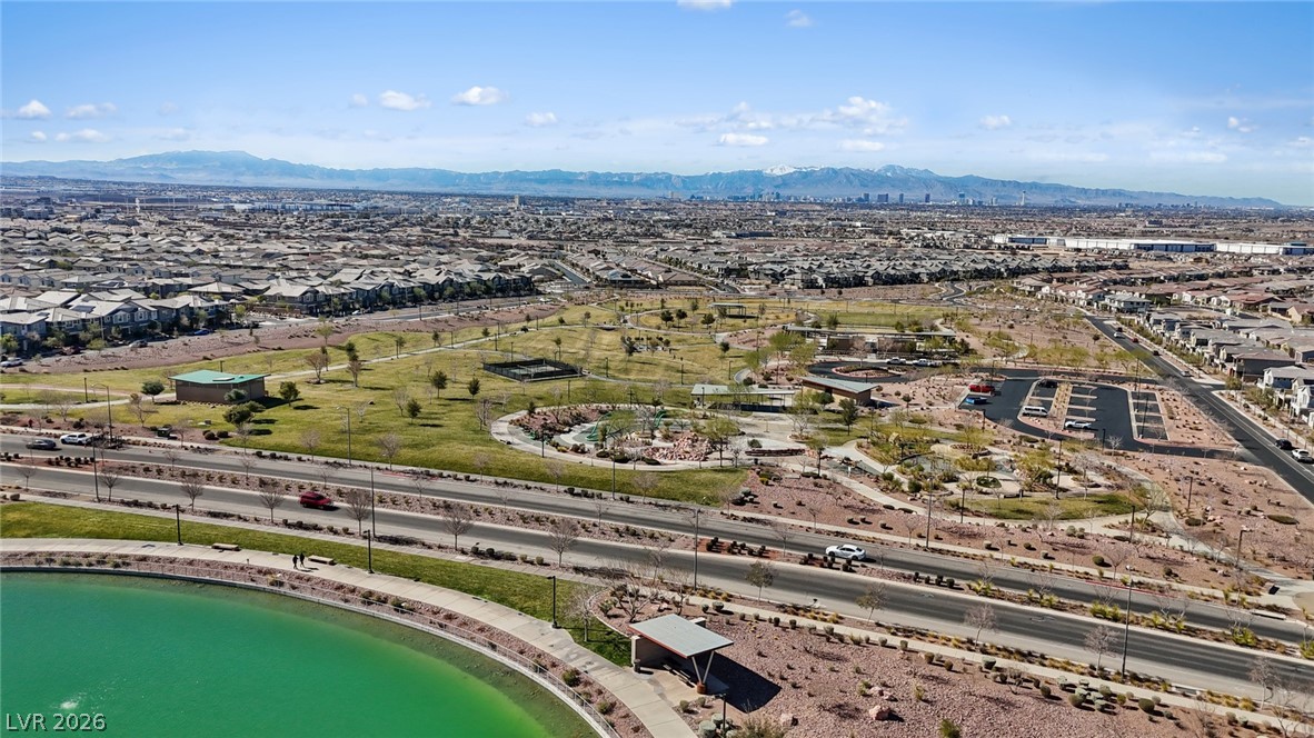 250 Dedication Avenue Henderson, NV 89011 - Photo 57 of 67 Aerial perspective of suburban area with a mountain backdrop