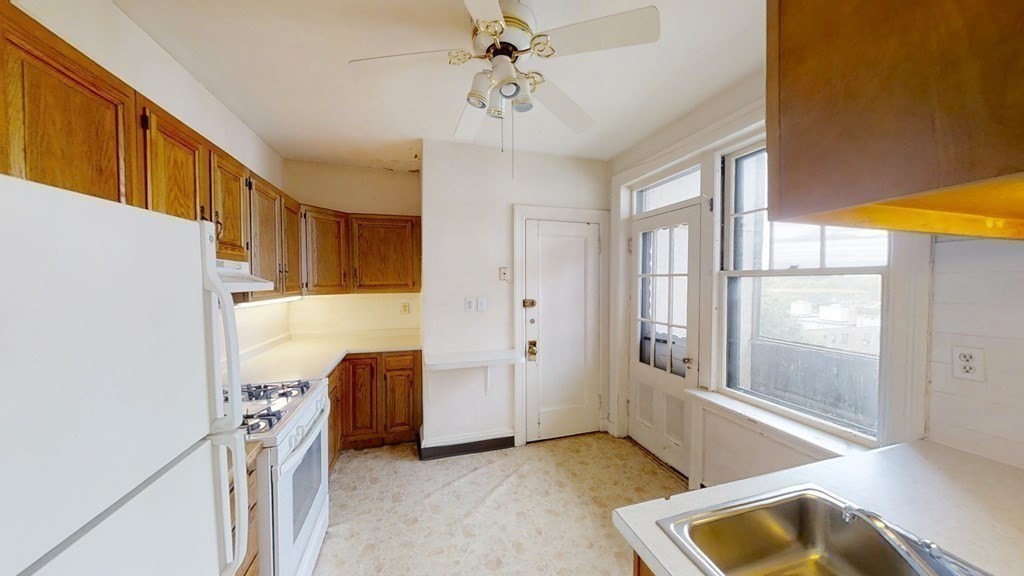 321 Tappan Street, Unit 6 Brookline, MA 02445 - Photo 12 of 14 a view of livingroom with furniture and ceiling fan