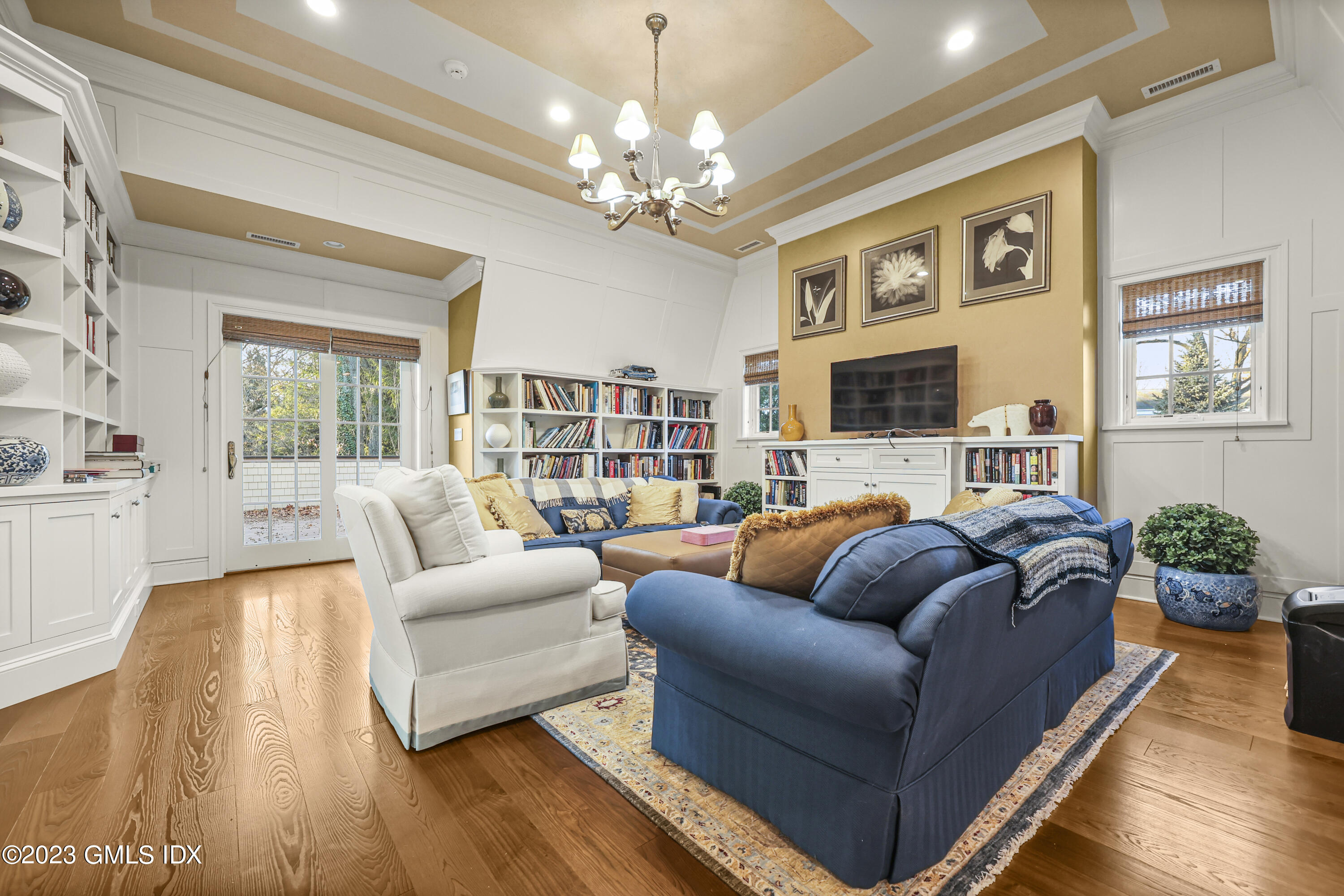 86 Winthrop Drive Riverside, CT 06878 - Photo 12 of 26 a living room with furniture fireplace and a large window