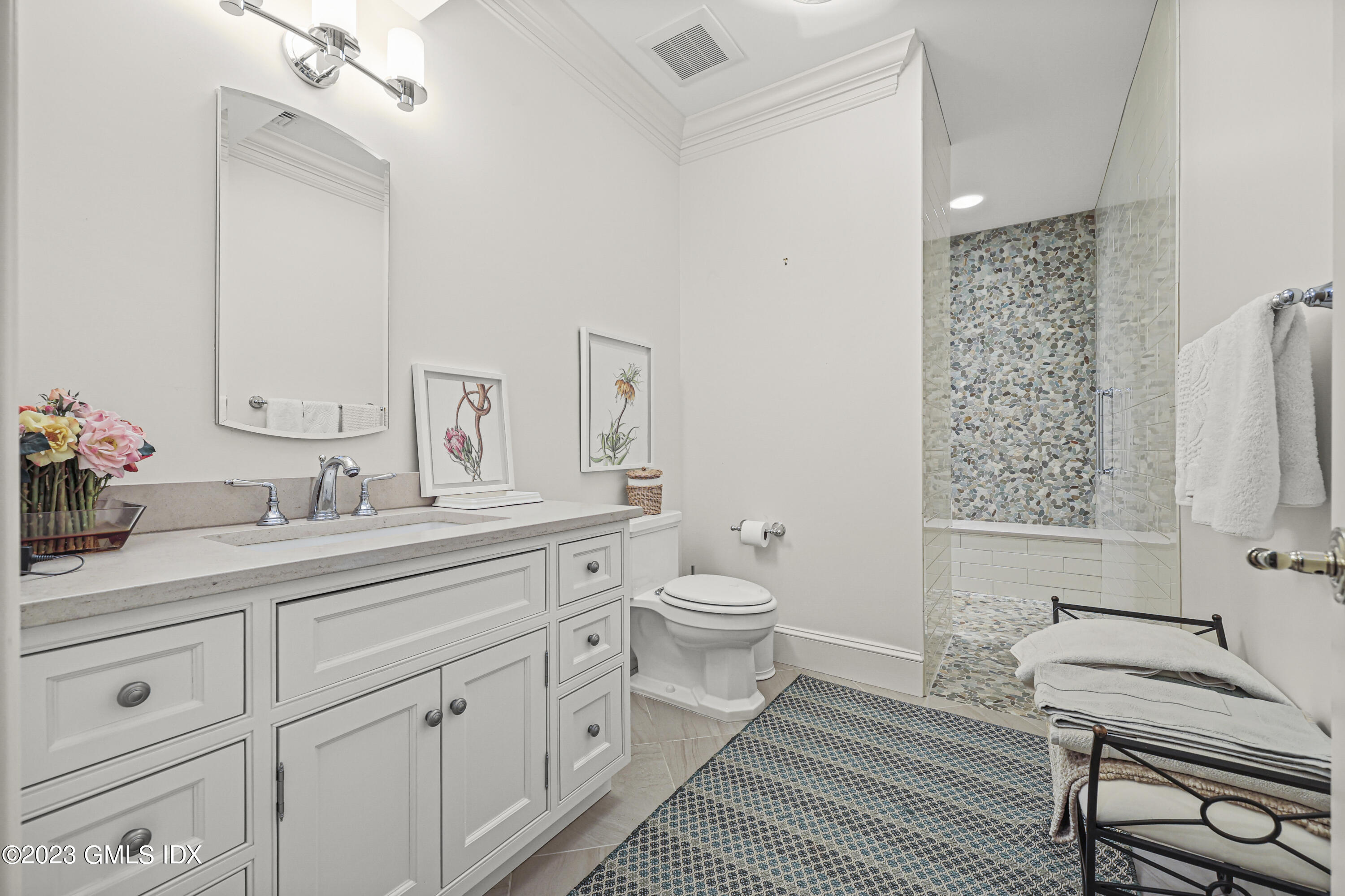 86 Winthrop Drive Riverside, CT 06878 - Photo 18 of 26 a spacious bathroom with a double vanity sink mirror and toilet