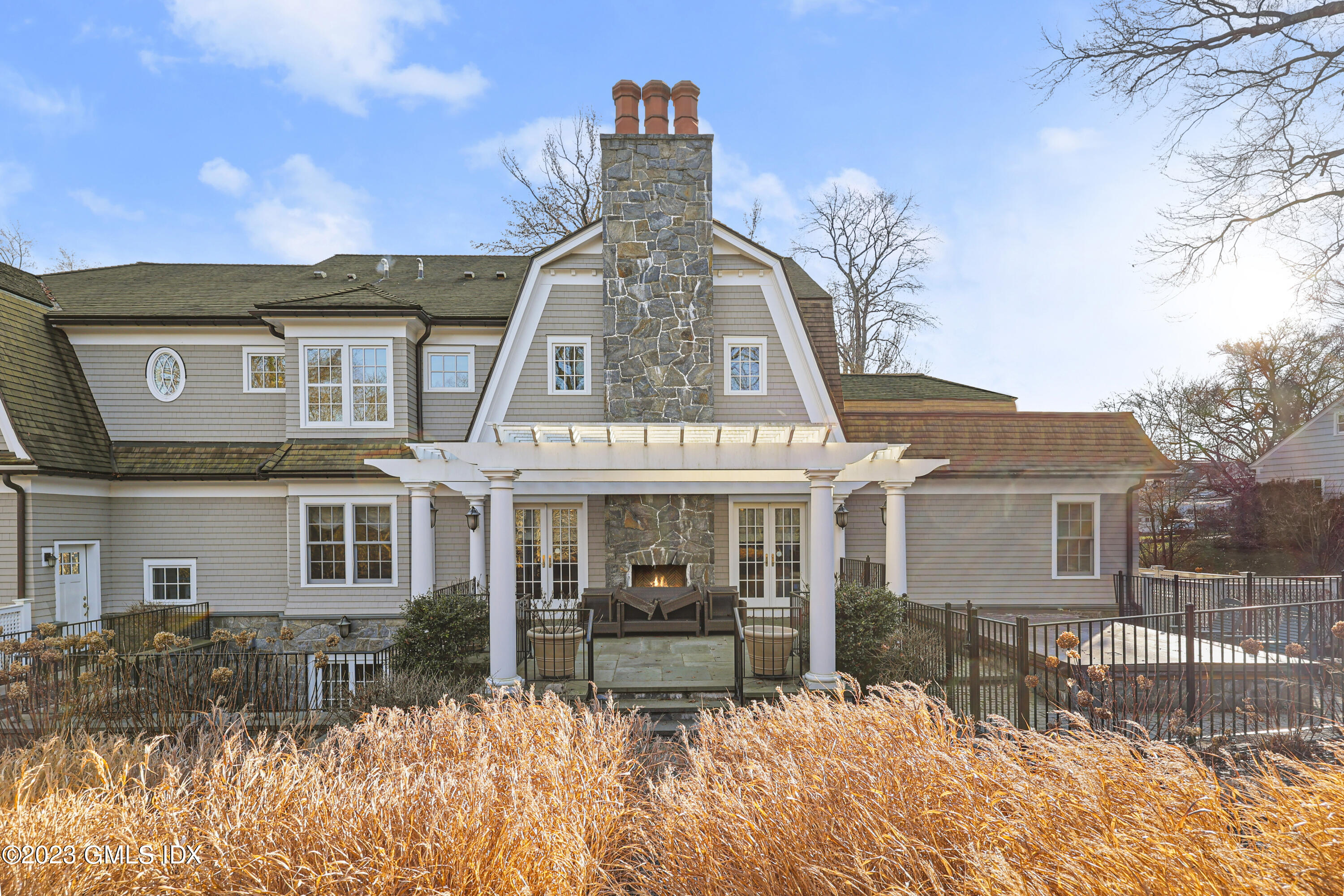 86 Winthrop Drive Riverside, CT 06878 - Photo 21 of 26 a front view of a house with a yard