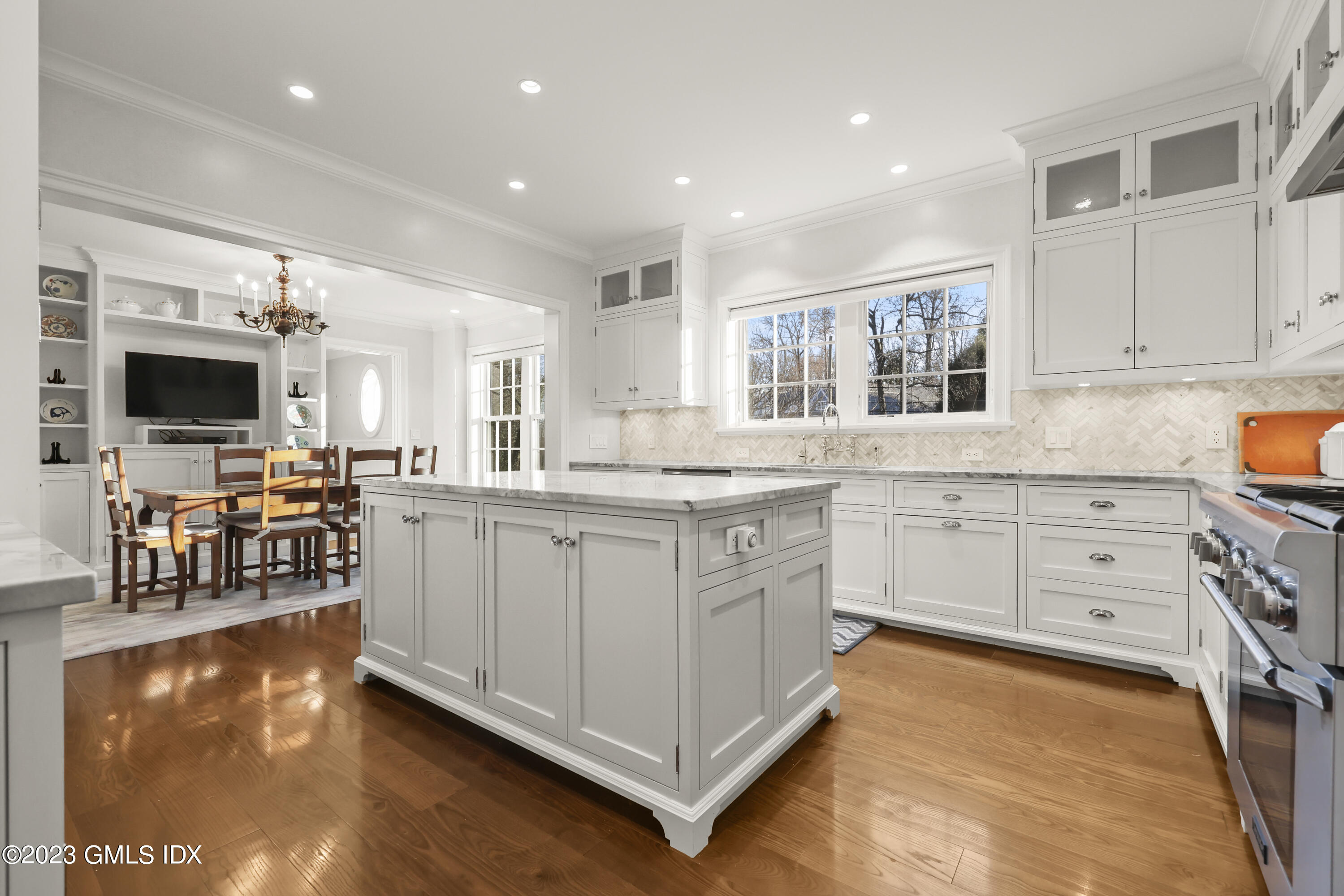 86 Winthrop Drive Riverside, CT 06878 - Photo 9 of 26 a kitchen with stainless steel appliances granite countertop a stove and a sink